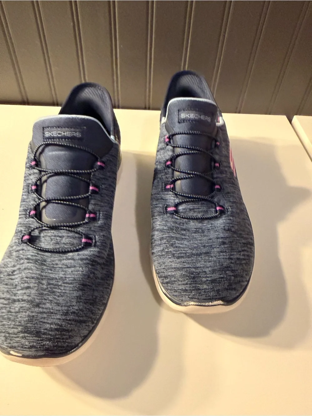 Skechers women’s slip navy -On Athletic Sneakers with Pink Accents